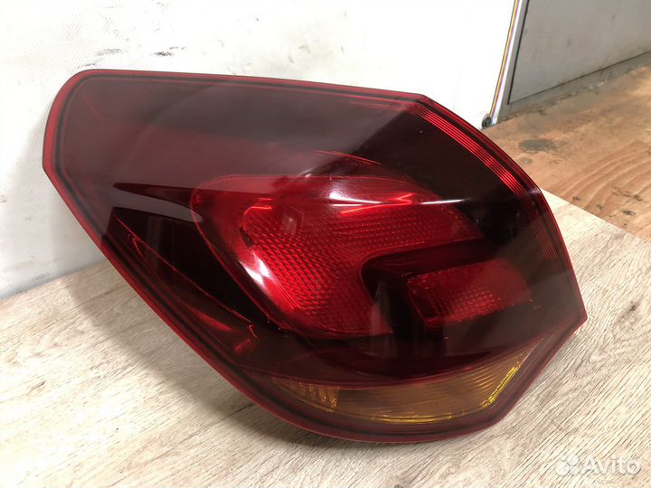 Левый Фонарь в крыло Opel Astra j