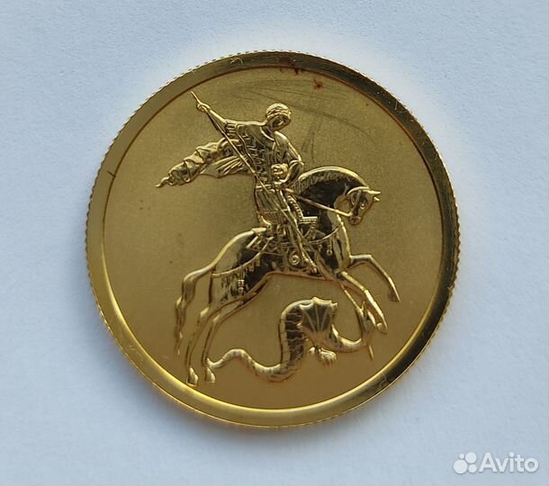 Золотые монеты с повреждениями