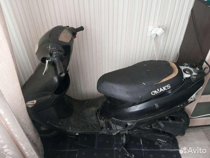 Скутер Omaks