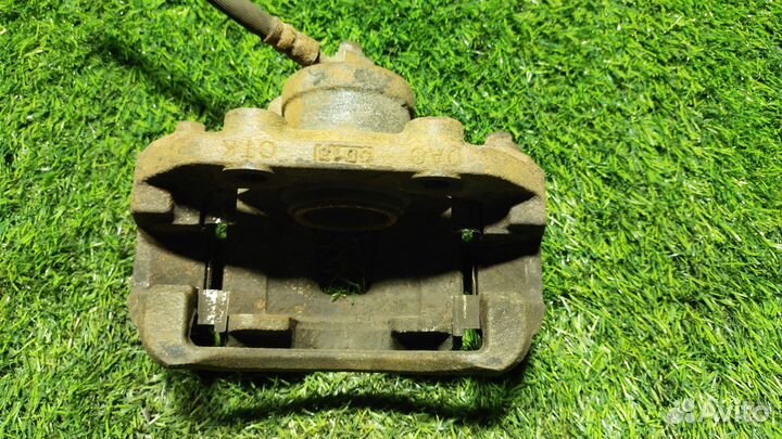 Суппорт Daewoo Nexia передний левый