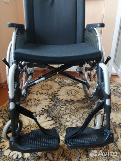 Инвалидное кресло