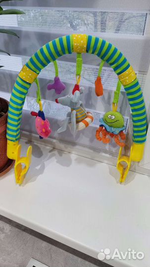 Игрушка для коляски