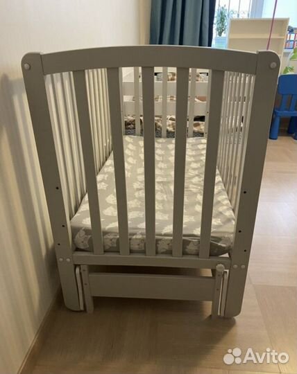 Детская кроватка с продольным маятником Гандылян
