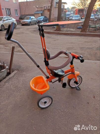 Трёхколёсный велосипед с ручкой