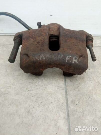 Суппорт тормозной передний правый Renault Kangoo 1