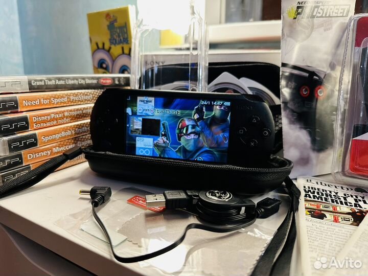 Sony PSP-E1008 Black 64 Gb(mega pack,3108 игр)