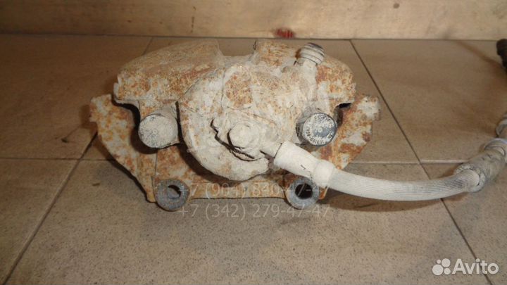 Суппорт передний правый Skoda Rapid 1