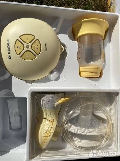 Молокоотсос medela swing flex