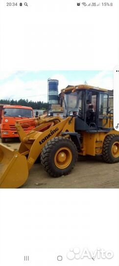 Услуги фронтального погрузчика Услуги самосвала
