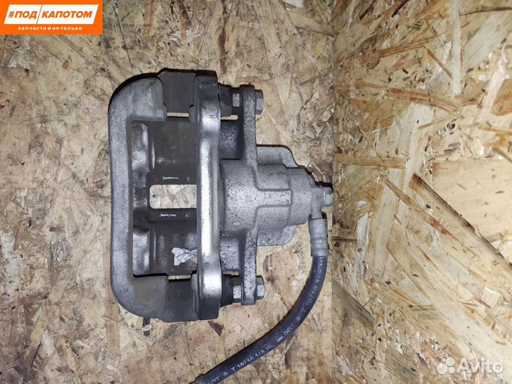 Суппорт тормозной задний левый Toyota Camry XV40