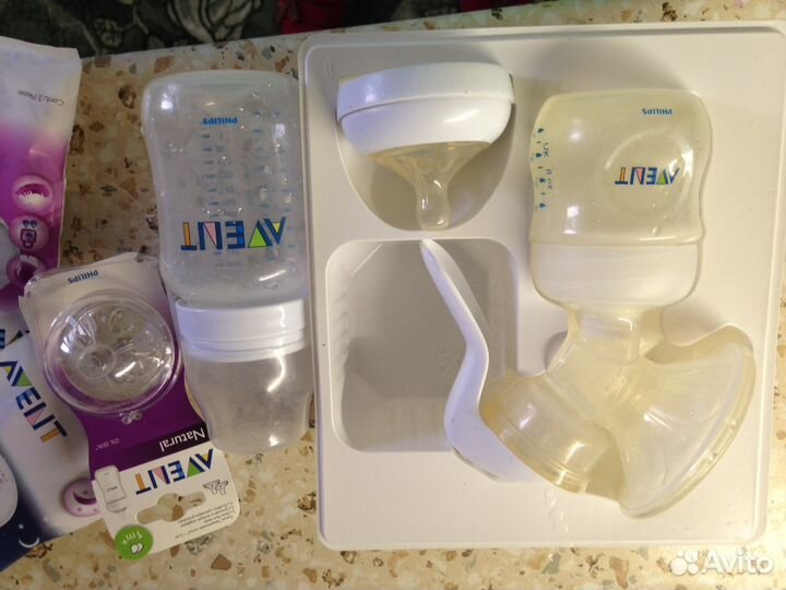 Молокоотсос ручной Avent + бутылочки