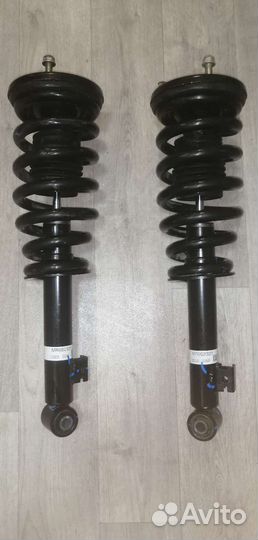 Передние стойки для L-200