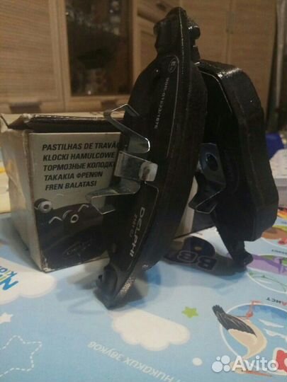 Колодки тормозные дисковые передние Delphi LP2101