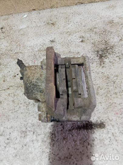 Суппорт тормозной передний правый renault logan 1