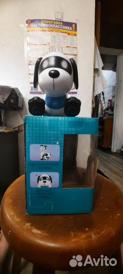 Игрушку собака акробат