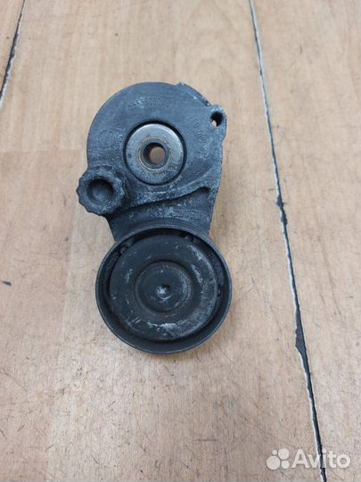 Натяжной ролик приводного ремня Opel Astra H