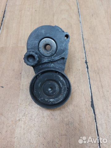 Натяжной ролик приводного ремня Opel Astra H