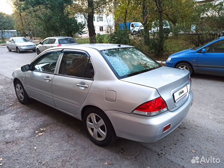 Mitsubishi Lancer 1.6 МТ, 2004, 198 000 км