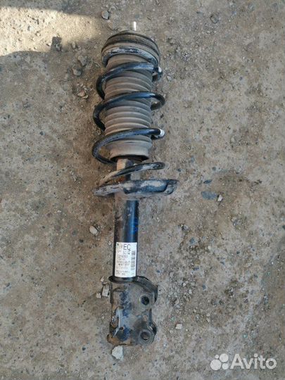 Амортизатор передний левый Opel Corsa D Z14XEP