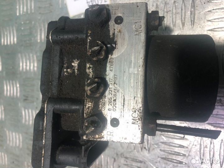 Блок ABS Nissan P12