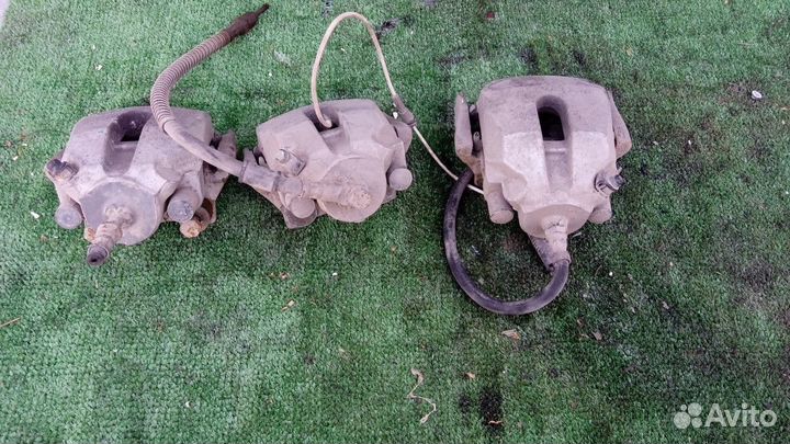 Суппорт тормозной задний BMW 5 серия