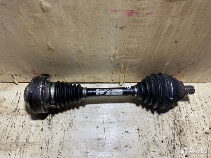 Приводной вал левый Passat B6 2,0 дизель МКПП P65