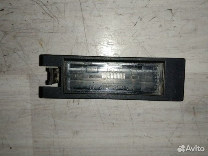 Подсветка номерного знака задняя Opel Astra J