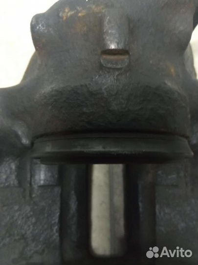 Суппорт тормозной передний правый Volkswagen Polo