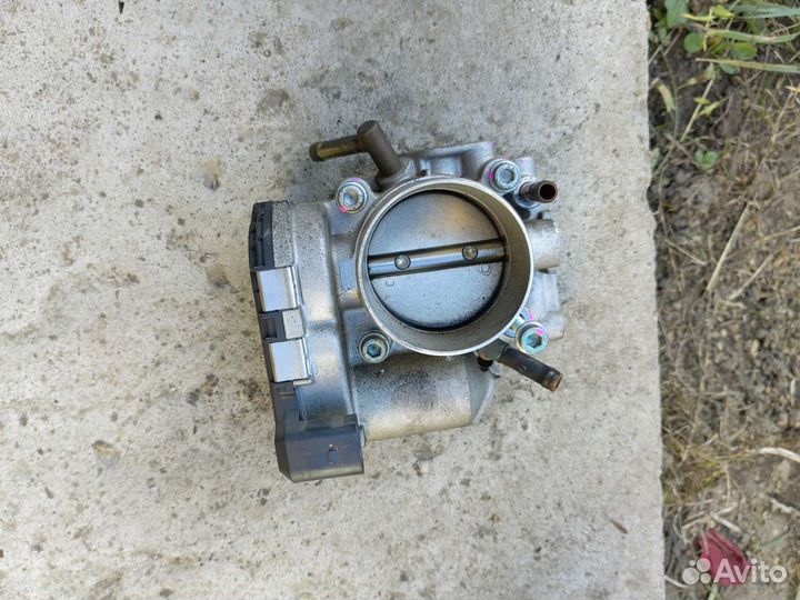 Дроссельная заслонка 06a133062d