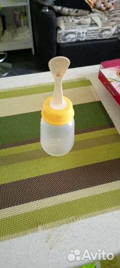 Бутылка с ложечкой