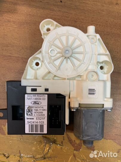 Мотор стеклоподъёмника задней правой двери Ford Fo