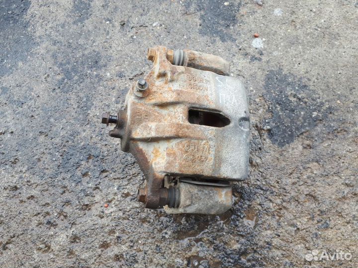 Суппорт передний левый Kia Sportage 3