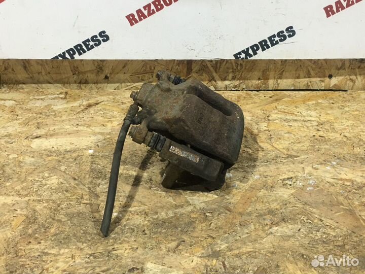 Суппорт тормозной передний левый Skoda Octavia A7