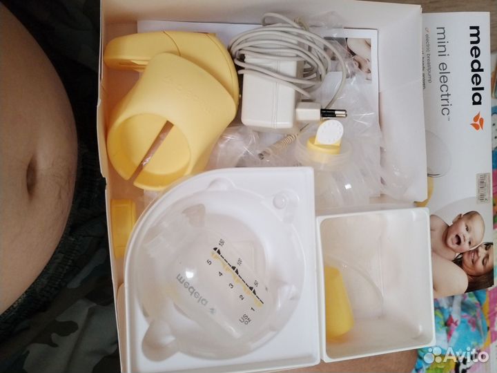 Молокоотсос medela электрический