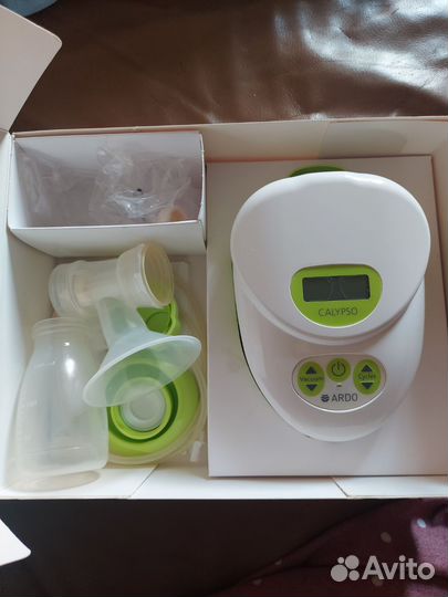 Молокоотсос medela электрический