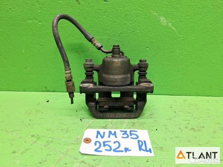 Суппорт задний левый nissan stagea