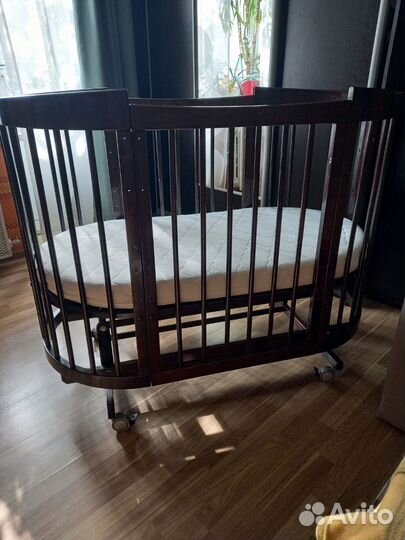Детская кроватка трансформер с маятником