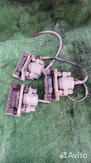 Суппорт тормозной задний BMW 5 серия