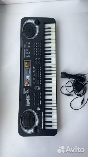 Музыкальный синтезатор игрушка