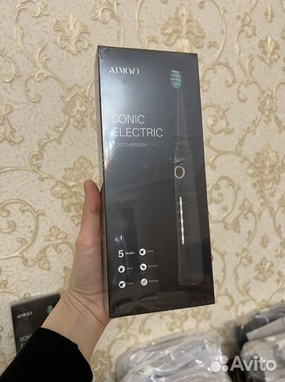 Электрическая щетка