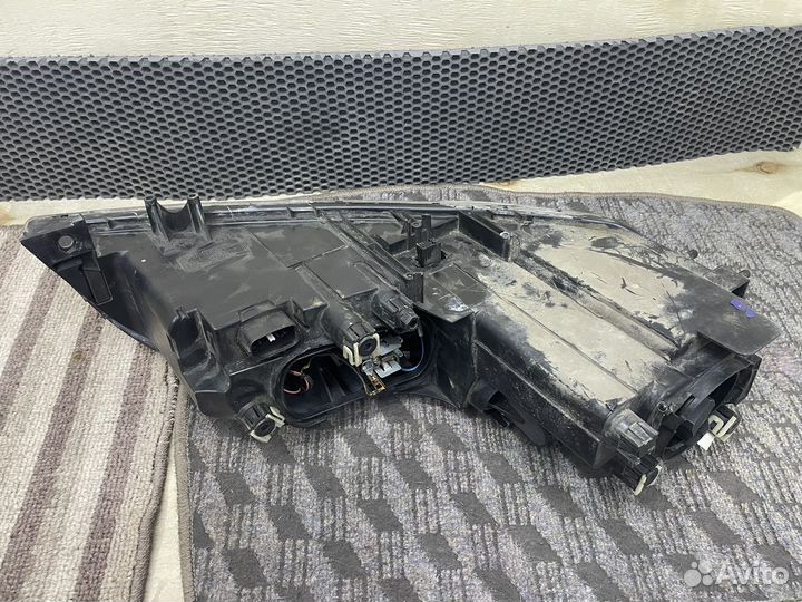 Фара галоген Mazda 6 F014003904 GG, левая