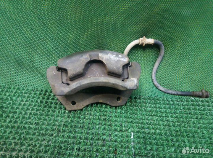 Суппорт передний левый Nissan Almera N16 N16