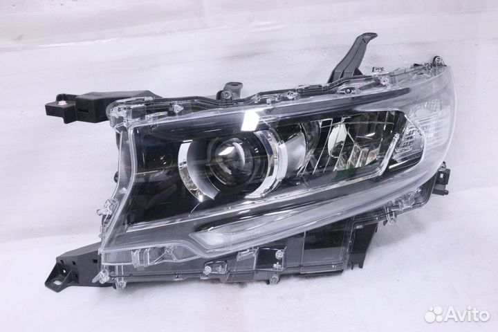 Фара левая новая ориг Toyota Land Cruiser Prado