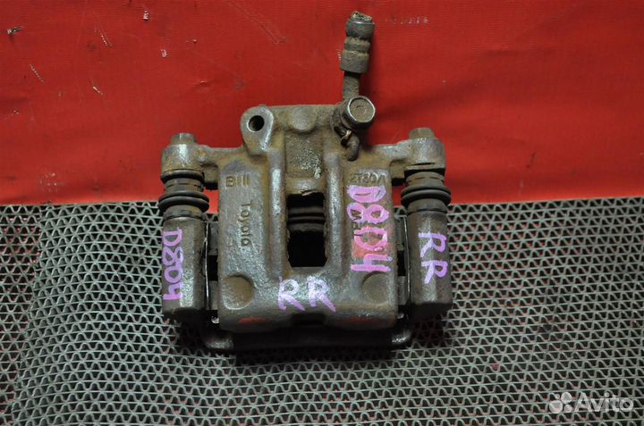 Суппорт задний правый toyota corolla ZZE120