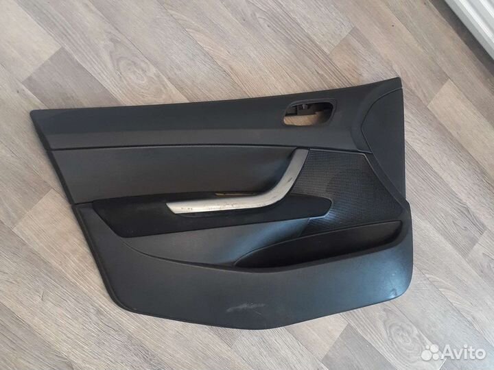 Обшивка двери передняя левая Peugeot 308 2007-2014