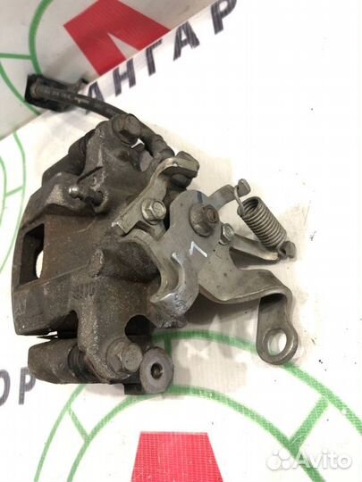 Суппорт тормозной задний левый Mitsubishi