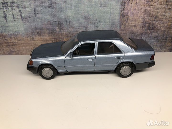 Cursor 1/35 Mercedes-Benz W124