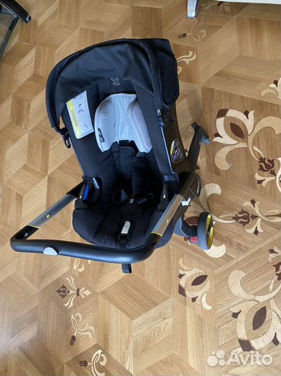 Коляска автолюлька doona