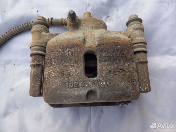 Суппорт тормозной передний правый Kia Picanto