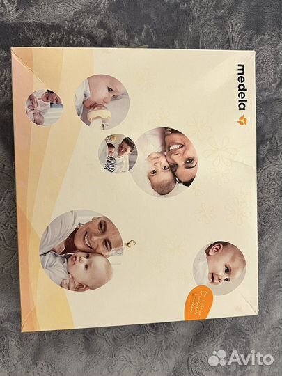 Молокоотсос medela электрический